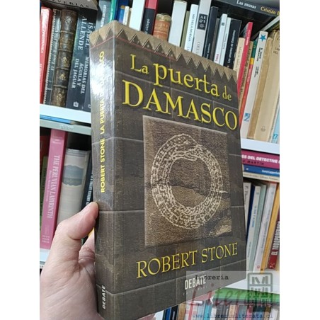 La puerta de Damasco Robert Stone Debate formato grande 509 páginas